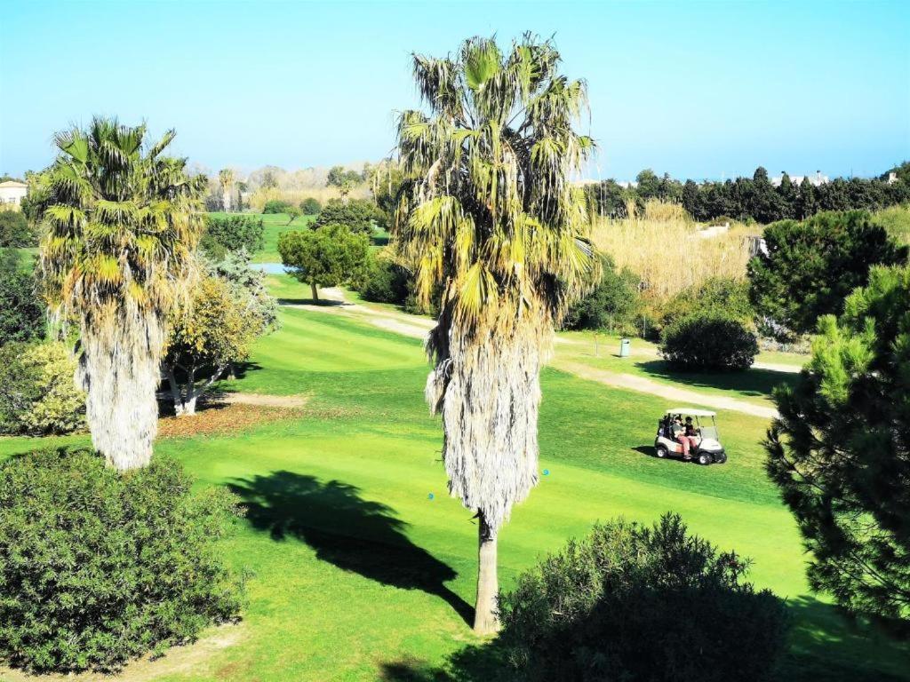 Апартаменты Oasis Hoyo 12 - Oliva Nova Playa Met&Golf Экстерьер фото